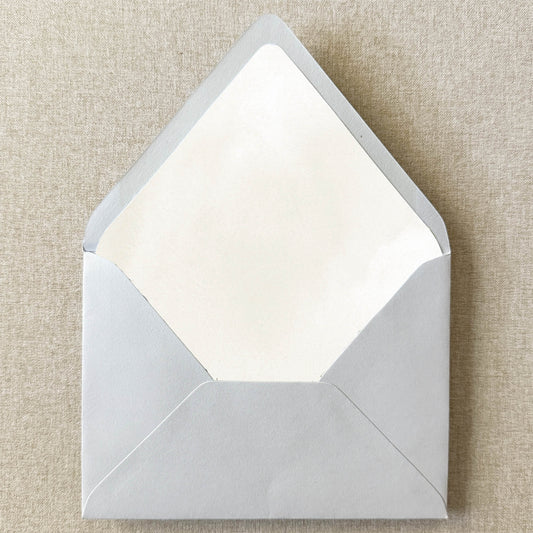 Ivory Cream Watercolor Envelope Liner on linen background