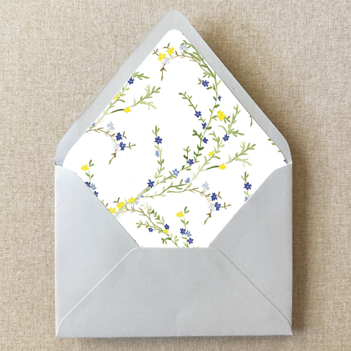 Blue and Yellow Floral Envelope Liner on linen background