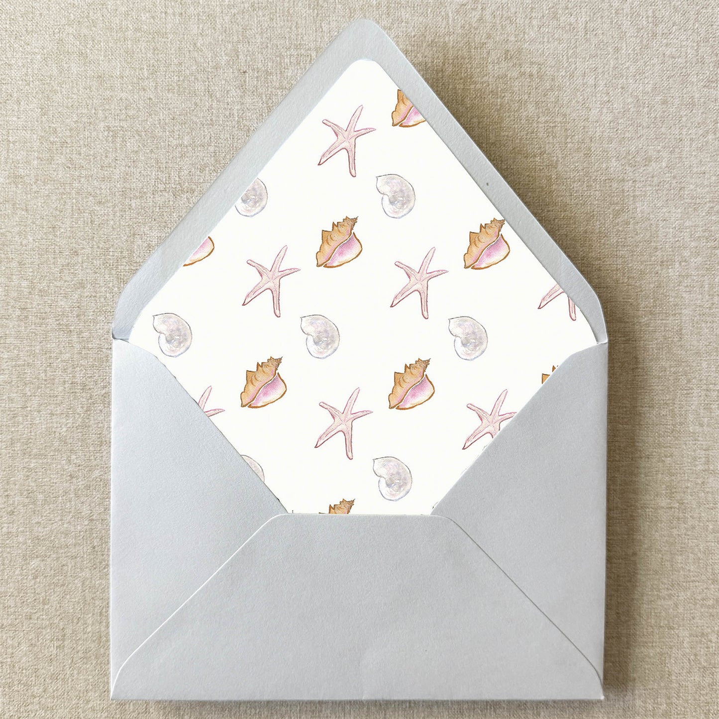 Tropical Seashell Envelope Liner on linen background