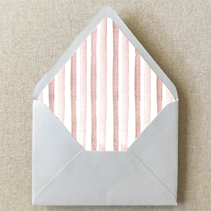 Blush Pink Stripe Envelope Liner on linen background